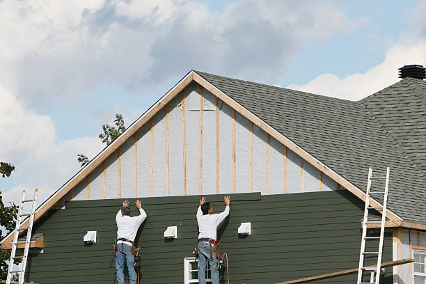 Professional Siding Replacement technician working in Falls Church, VA